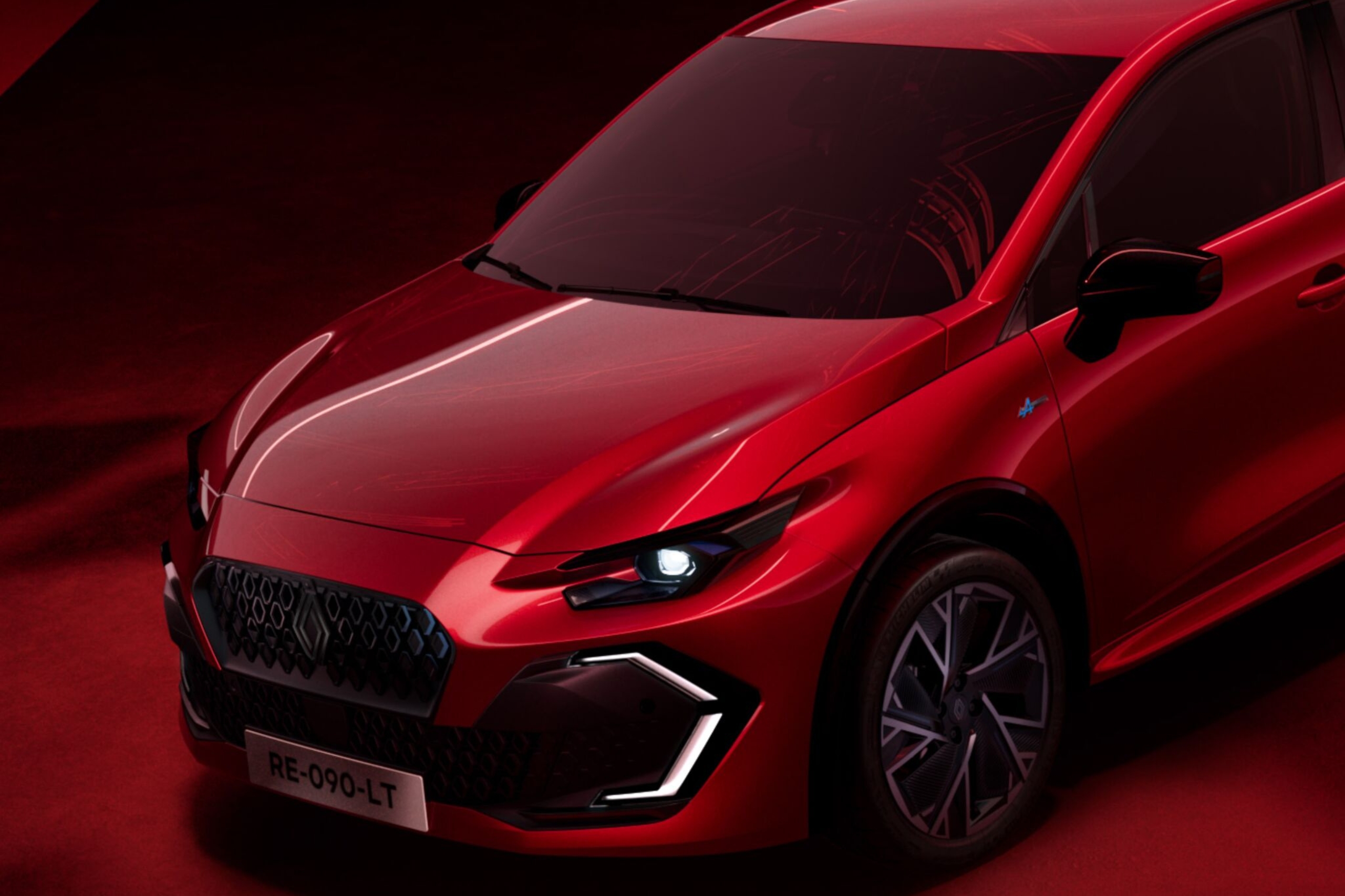 dettaglio dell’anteriore della nuova renault clio rossa fiammante